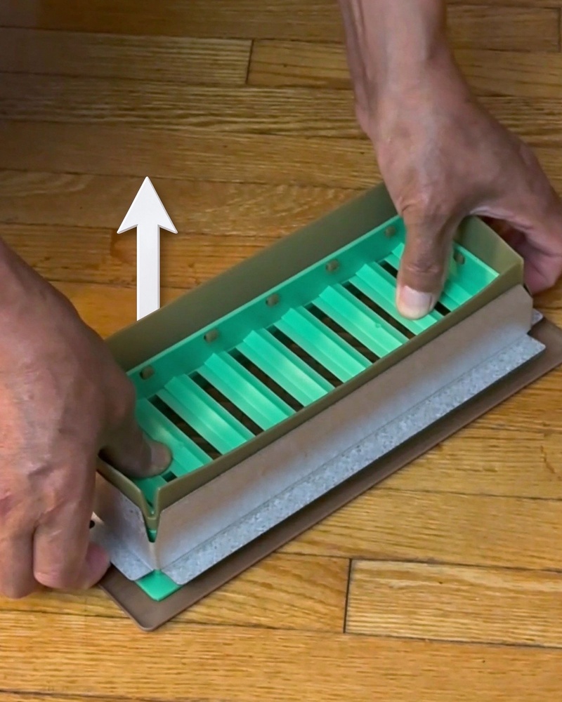 Lift the sealing frame upward